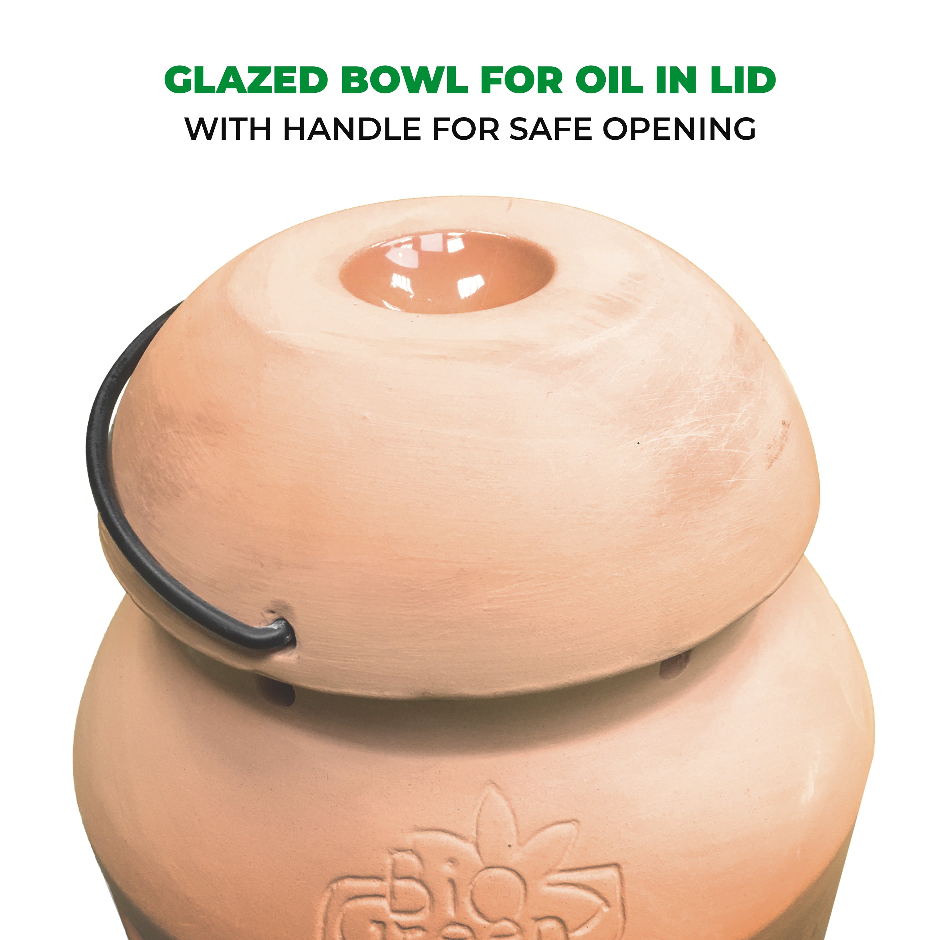 This image shows the Biogreen Firefly Frost Guard Heater, highlighting the glazed bowl for oil in the lid. The bowl is designed for adding oil and is equipped with a handle for safe opening. This feature allows for the efficient and secure operation of the heater while ensuring safety. The terracotta design and functional elements, such as the handle, make the product easy to use and ideal for protecting plants during cold weather.