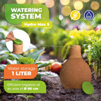 Hydro Max S Watering System – 1L Self-Watering Vessel – The image shows the Hydro Max S watering system, featuring a terra cotta-colored vessel with a green top. The system offers efficient irrigation for an area with a 60 cm radius, providing 1 liter of water storage. The vessel is designed to water plants in garden beds with ease, ensuring consistent hydration with minimal effort.