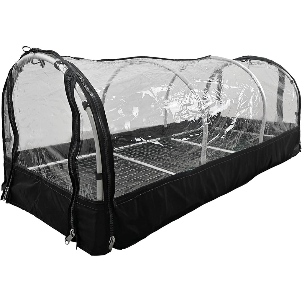 "Portable greenhouse with a transparent plastic cover, zippered sides, and a metal shelving unit inside. The structure is designed for plant propagation and protection."