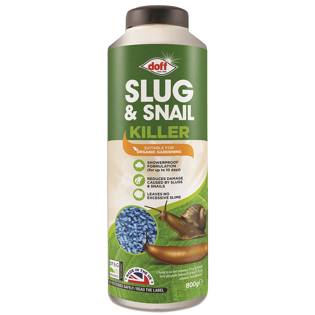 Doff Slug & Snail Killer 800g – The image shows a container of Doff Slug & Snail Killer 800g, featuring a green and cream-colored design with a prominent label. The product is suitable for organic gardening, offering effective protection against slugs and snails. The container mentions key benefits such as showerproof formulation for up to 10 days, reducing damage caused by slugs and snails, and leaving no excessive slime. The product is presented with blue pellets for easy application.