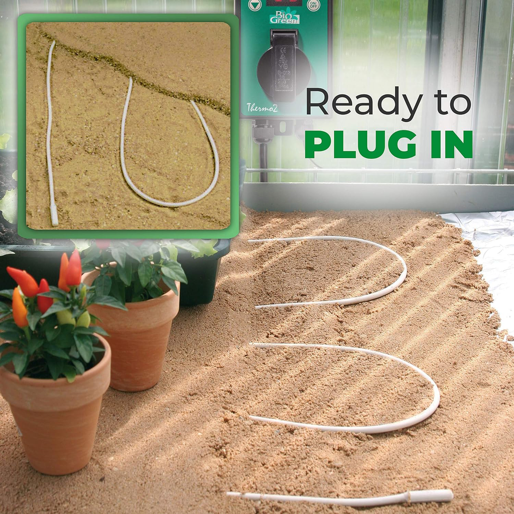 The image shows a flexible soil heating cable neatly laid out in a curved pattern, ready to be plugged in for use. The setup is designed to warm the soil, promoting healthy plant growth. A visible "Thermo2" thermostat is also shown, indicating that the system is ready to operate and regulate the temperature for optimal plant care.